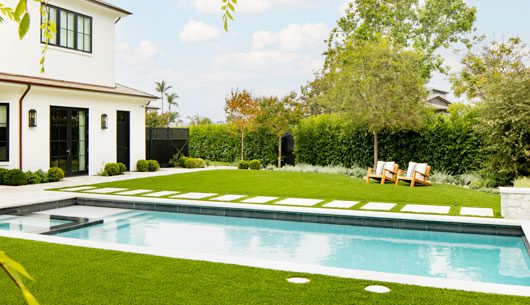 artificial turf installation project with pool